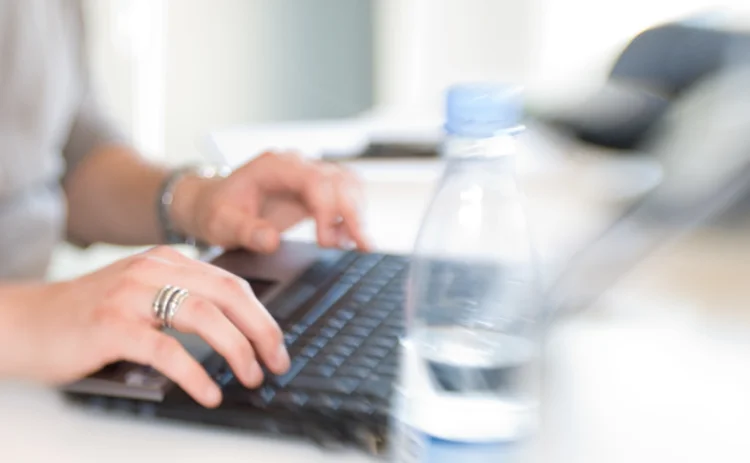 Person working on a laptop at home